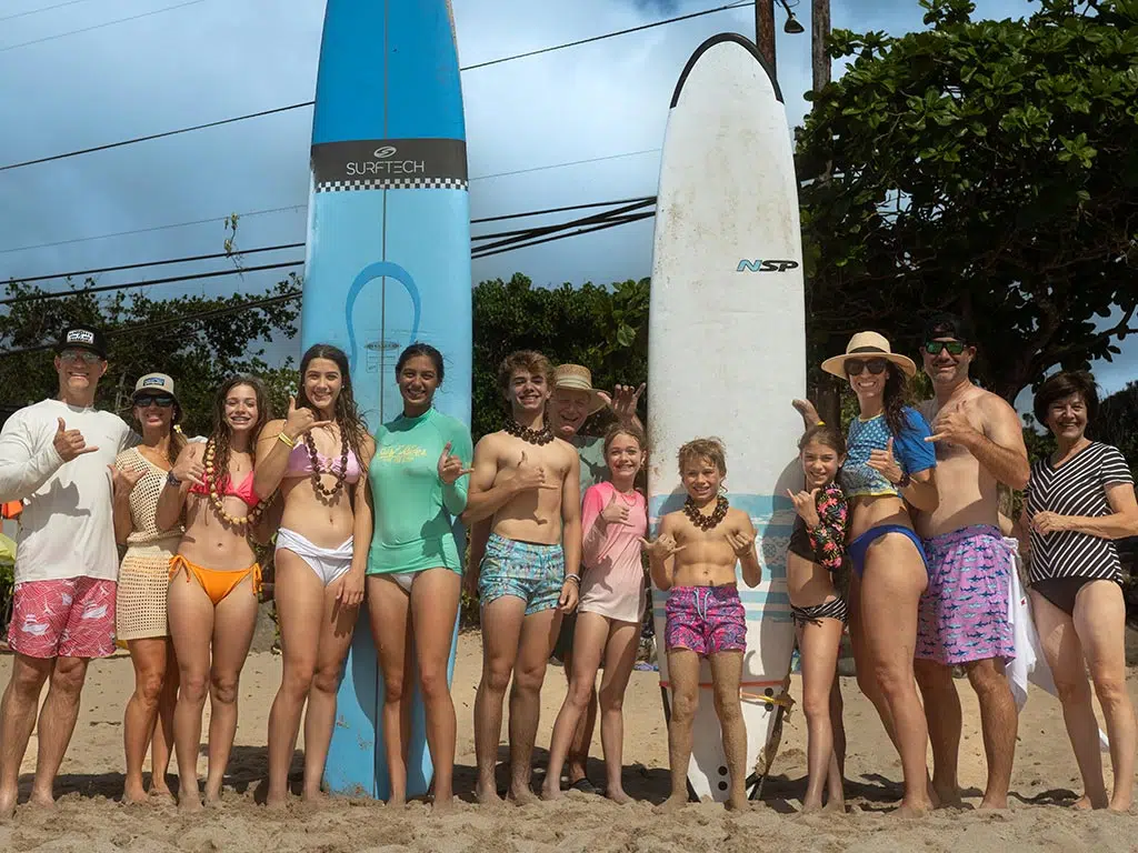Oahu surf school, North Shore. Surfing school instructors with students.