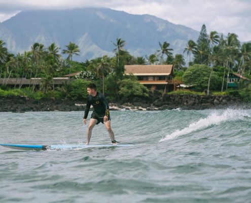Student learning how to surf, Pue'ena Point, Oahu, HI.