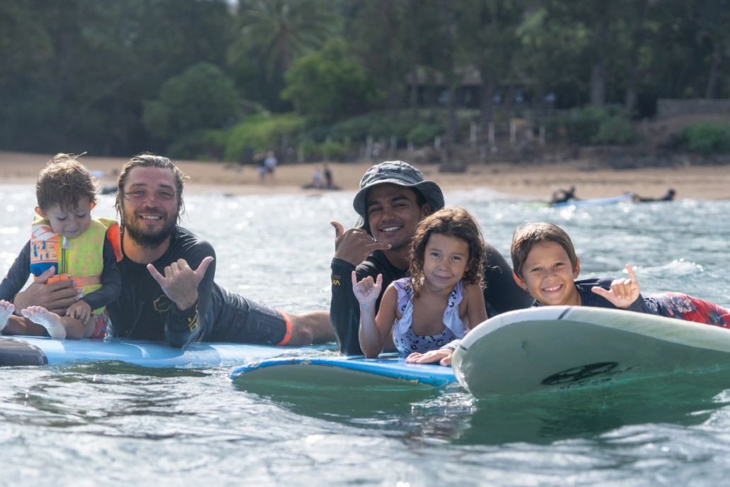 Oahu group surfing lessons for families at North Shore Oahu Surf School. Family surfing lessons with Kala Grace are a great way to teach your keiki how to surf in Hawaii.